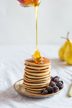 Pancakes drizzled with honey
